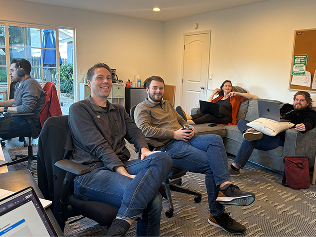 A photo of the Constructable team working together at the office